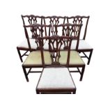 A set of six period Chippendale style mahogany dining chairs, the scalloped back rails with shell