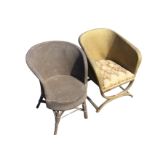 A Lloyd Loom style gilt armchair with sprung seat, raised on curved cross-frame supports joined by