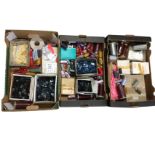 A large quantity of cotton threads on reels, zips, boxes of buttons, snap fasteners, bobbins, hook &