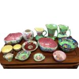 A collection of Maling pottery including a tulip bowl, a pair of scalloped bowls, a graduated pair