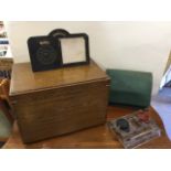 A dovetailed oak box with two sliding internal trays; a Moroccan leather desk stationary compartment