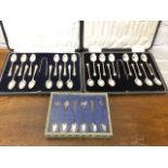 A cased set of twelve hallmarked silver teaspoons with a set of tongs - Sheffield 1928, Cooper Bros;