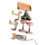 A pair of heavy cast iron dumb-bells; a cast iron gutter hopper; two cast iron shoe lasts; an