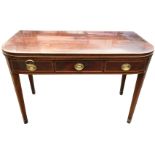 A nineteenth century turn-over-top tea table, the rounded twin leaves inlaid with boxwood & ebony