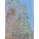 A pine framed C20th Bartholomews half-inch map of Northumberland, the coloured sheet centered on