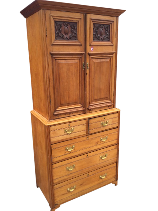 A married Victorian satin walnut press cupboard, with moulded cornice above two scroll carved and