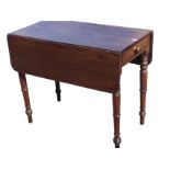 A nineteenth century mahogany pembroke table with two rule-jointed rounded drop-leaves above a