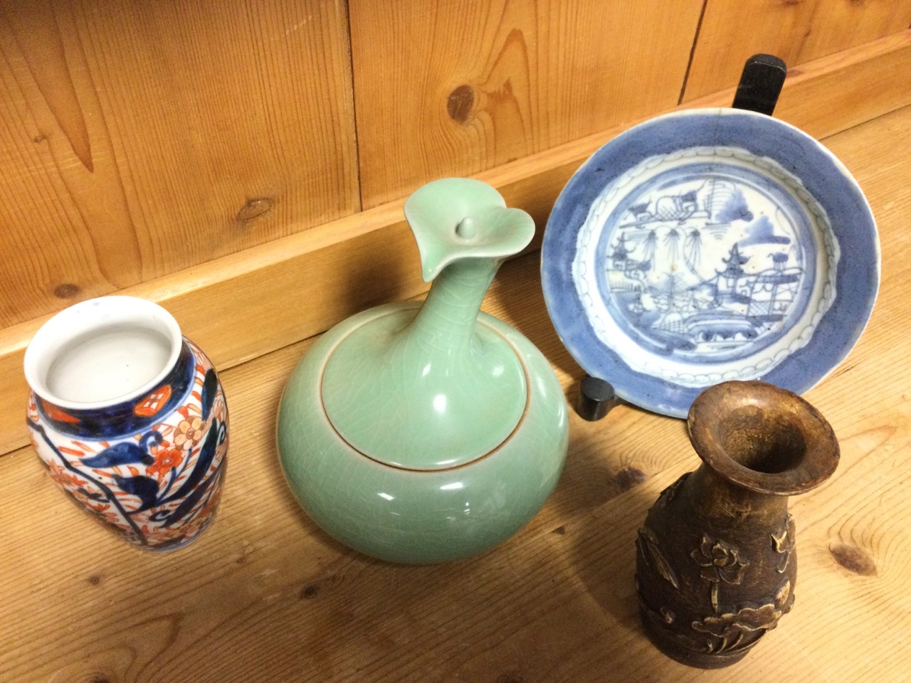 An ovoid Imari vase decorated in the traditional blue, brick-red and gilt floral palette; a - Image 3 of 3