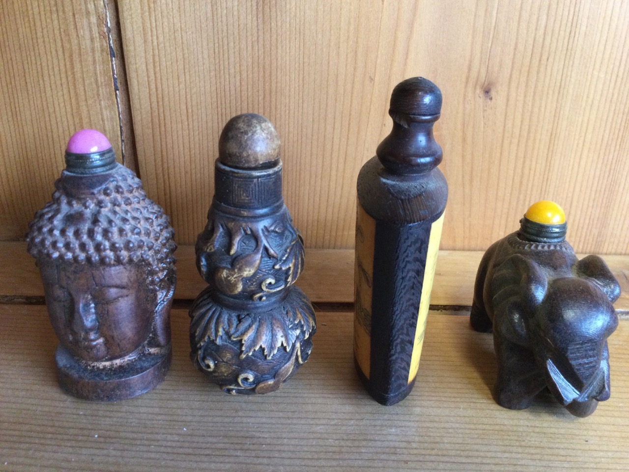 A carved wood snuff bottle with buddha head to sides; another carved hardwood bottle in the form - Image 3 of 3