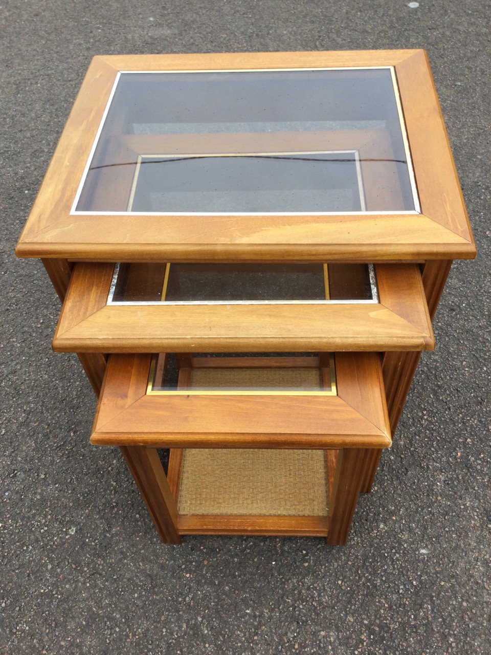 A nest of three 70s coffee tables with rectangular glass panels to moulded tops, raised on square - Image 2 of 3