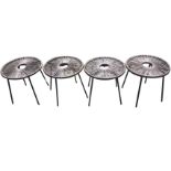 A set of four new circular outdoor stools, with strung seats on metal frames with angled legs. (4)
