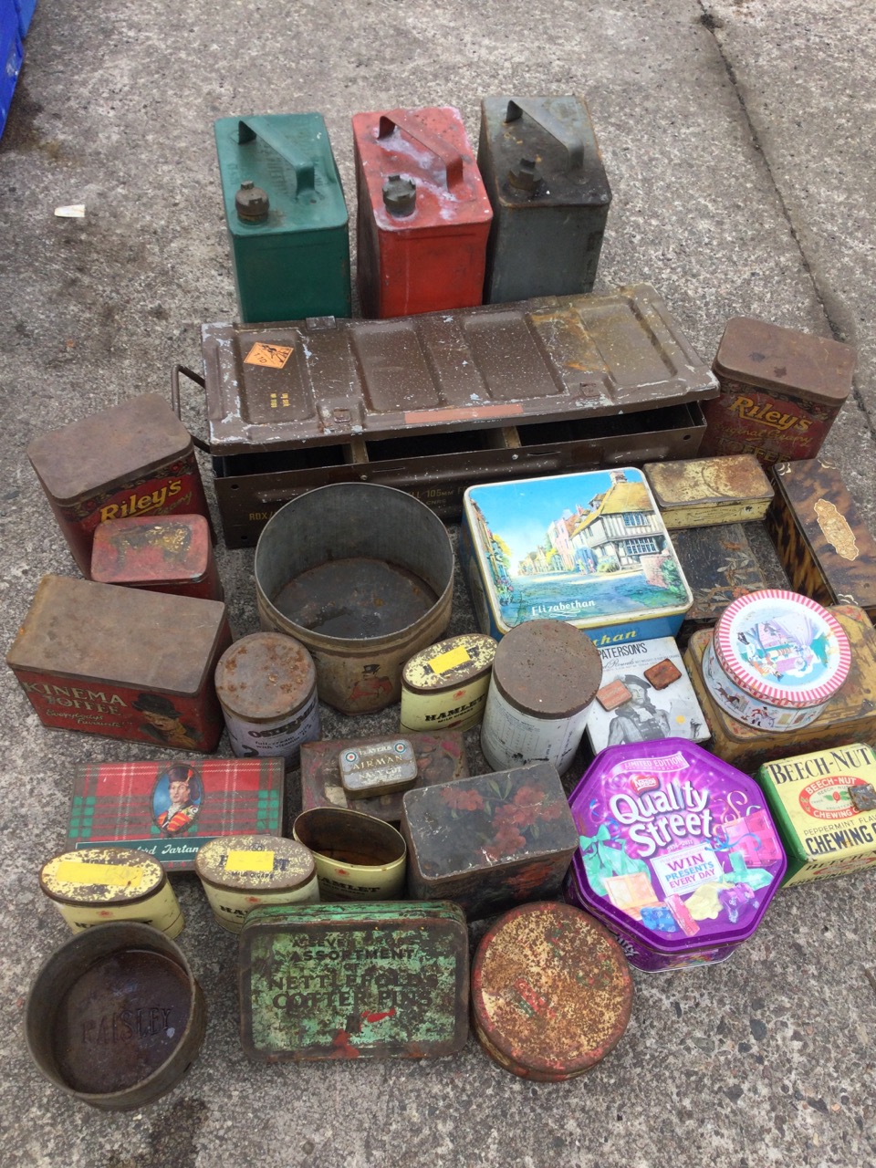 Miscellaneous tins including three shell oil cans, biscuit tins, an ammunition box, toffee tins,