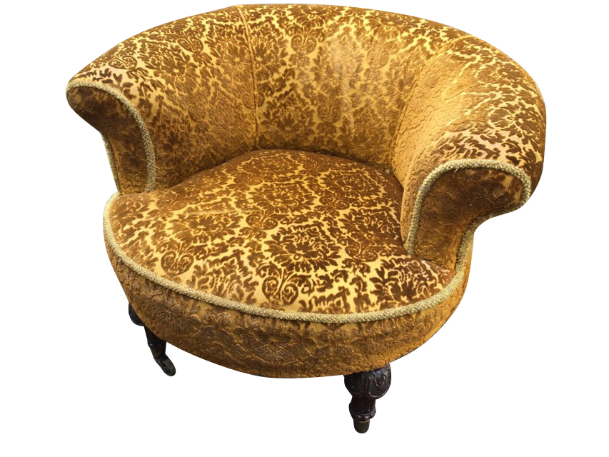 A Victorian mahogany tub armchair, the rounded upholstered back above a circular sprung seat, raised