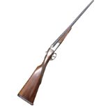 A Gunmark Kestrel side-by-side 20 gauge shotgun, the walnut stock having box-lock engraved with