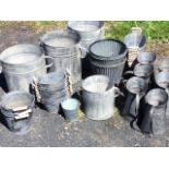 A florists backroom stock of galvanised tubs, buckets, jugs, fluted pots, oval tubs - some with wood