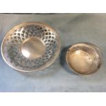 A hallmarked silver bon-bon dish with pierced sides and beaded rim having swing handle - Birmingham;