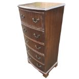 A bowfronted mahogany chest with moulded top above five drawers mounted with scrolled drop