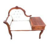 A mahogany telephone table, with rectangular tray-top platform above a fielded panelled drawer,