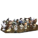 A collection of bird figurines including Beswick, Lladro, Border Fine Arts, Goebel, Royal Doulton,