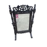 A nineteenth century carved Chinese dressing table mirror, inlaid with mother-of-pearl decoration