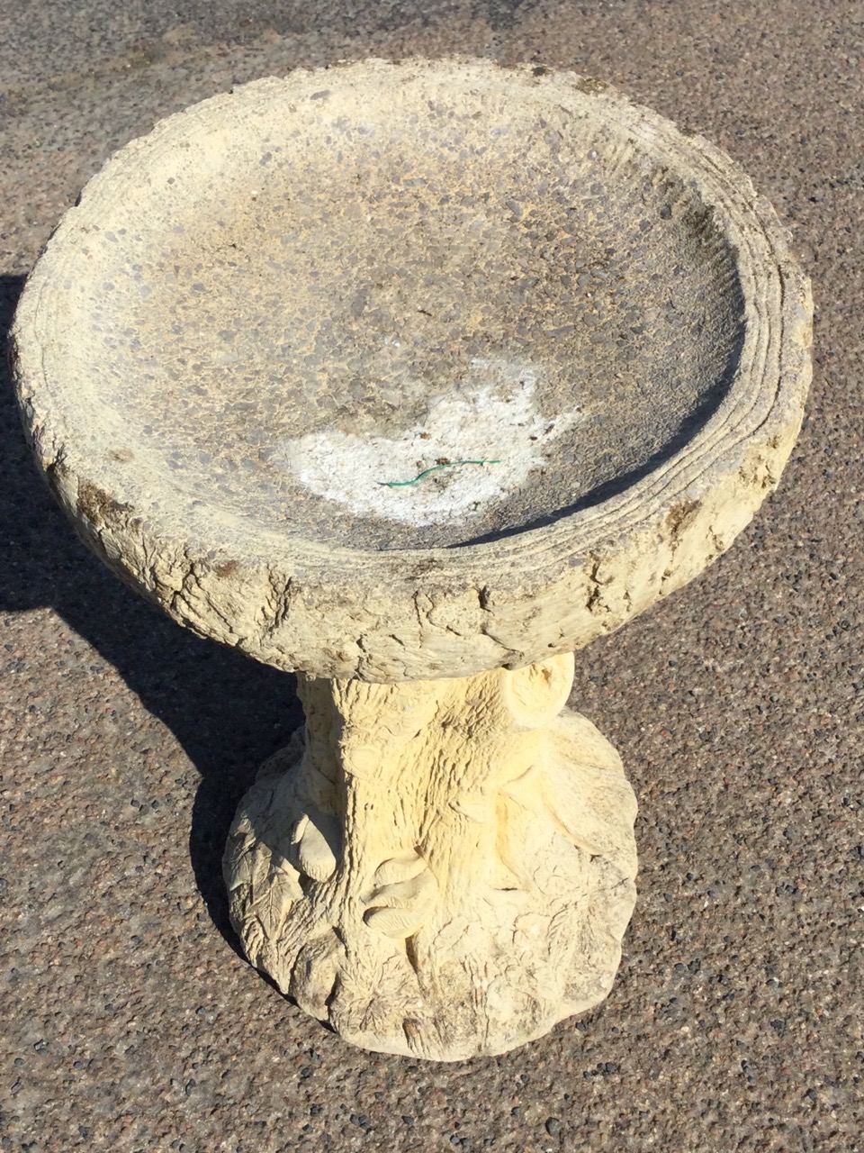 A composition stone birdbath, the dished log moulded bowl on treetrunk column support. (18in x 23. - Image 2 of 3