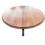 A circular Victorian mahogany breakfast table, the moulded top supported on a bulbous turned column,