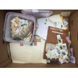 A stamp collection with loose stamps, pages from albums, envelope covers, a carton of German stamps,