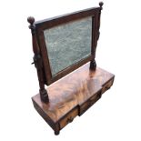 A nineteenth century breakfront mahogany dressing table mirror, the bevelled plate on turned columns