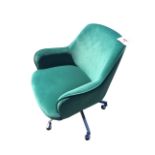 A new contemporary revolving green velvet upholstered office chair, the rise-and-fall sprung seat on