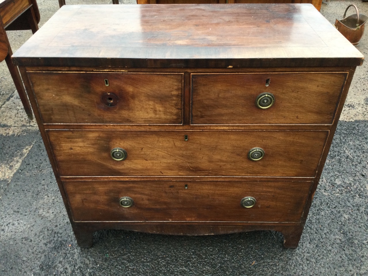 A nineteenth century mahogany chest of drawers, the crossbanded top above two short and two long - Image 2 of 3
