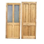 An unused glazed pine door with acid etched rectangular panels; and another with four fielded
