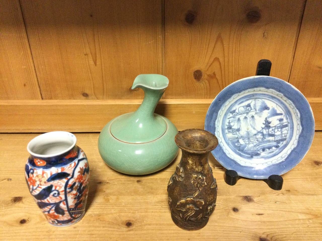 An ovoid Imari vase decorated in the traditional blue, brick-red and gilt floral palette; a - Image 2 of 3