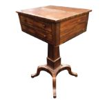 A George IV mahogany work table, the rectangular ebony strung top above two knobbed drawers,