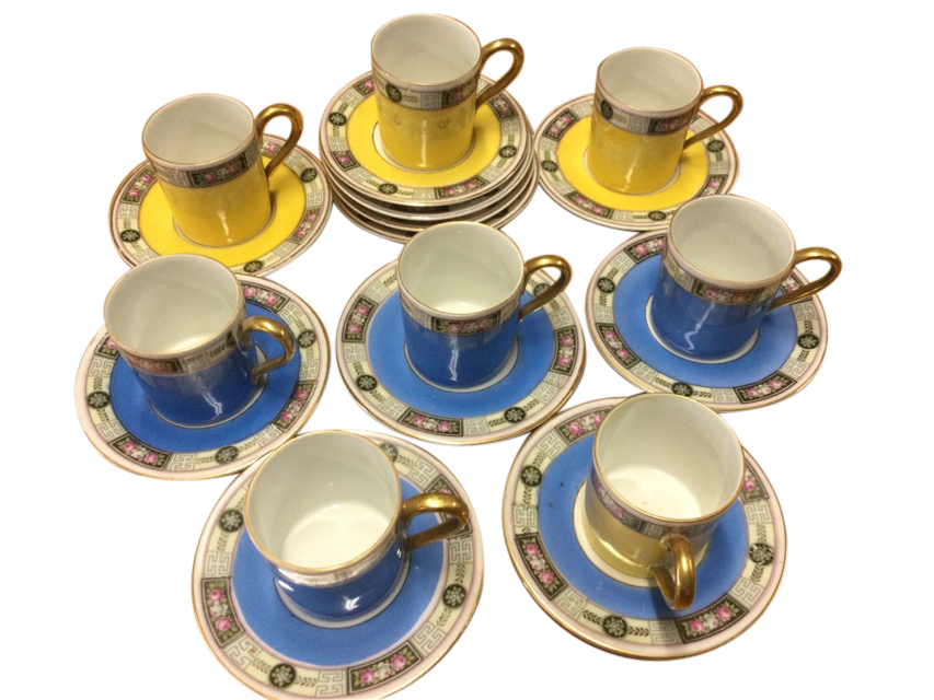 An Edwardian German Altwasser part coffee set with yellow & blue tubular cans having floral borders.