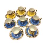 An Edwardian German Altwasser part coffee set with yellow & blue tubular cans having floral borders.