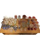Miscellaneous drinking glasses including sets of wine glasses, engraved hock glasses, a cordial