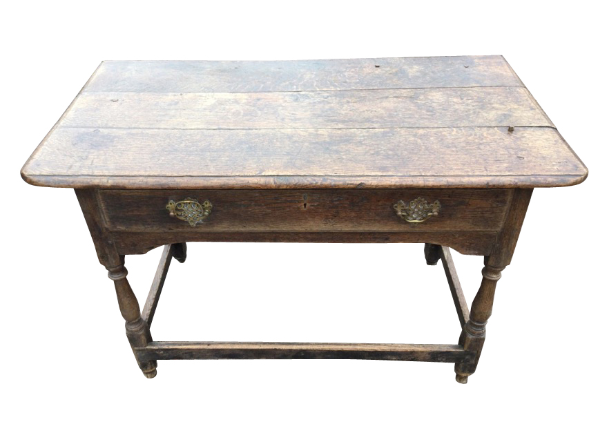 An eighteenth century oak side table with rectangular moulded three-plank top above a long frieze