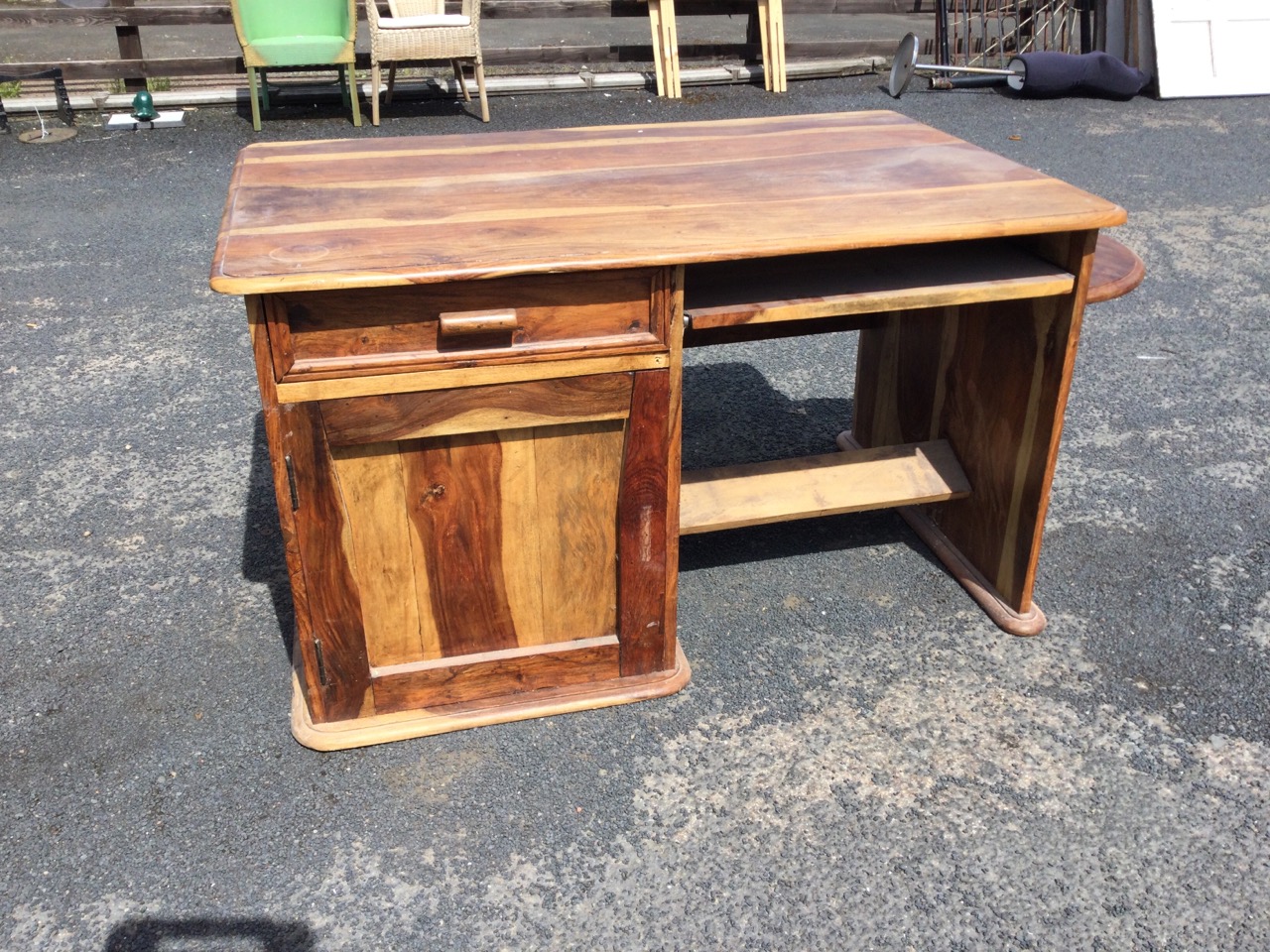 A hardwood desk with rectangular rounded moulded top above a drawer and panelled door cupboard - Image 2 of 3