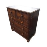 A nineteenth century country oak chest of drawers, with rectangular moulded top above two short