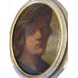 An oval nineteenth century oil on board, head of a young gentleman with hat, in gilt & gesso