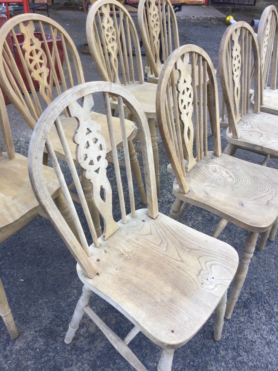A married set of eight wheelback kitchen chairs, the arched backs on spindles with pierced splats - Image 2 of 3