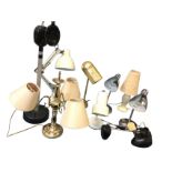 Nine tablelamps including an anglepoise style lamp, reading lights, a brass pedestal with three