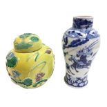 A Chinese majolica style ginger jar & cover with applied decoration of lilies, lotus flowers and