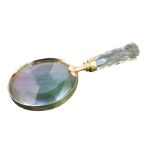 A library magnifying glass with circular lens in brass mount on tapering glass handle with diamond