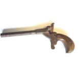 A miniature Fritum starting pistol, the tubular barrel with octagonal collar having hardwood handle.