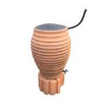 A ribbed terracotta style barrel water butt on fluted stand, with tap and cover. (41.5in)