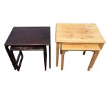 A rectangular pine nest of two tables on turned legs; and a mahogany duo on rectangular frame type