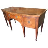 A nineteenth century bowfronted mahogany sideboard, the crossbanded top inlaid with boxwood