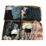 Four boxes of miscellaneous fabric, curtains, mainly new - tartans, balackout type material, blue