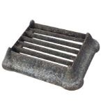 A Victorian cast iron bootscraper with five blades in rectangular moulded frame with rounded
